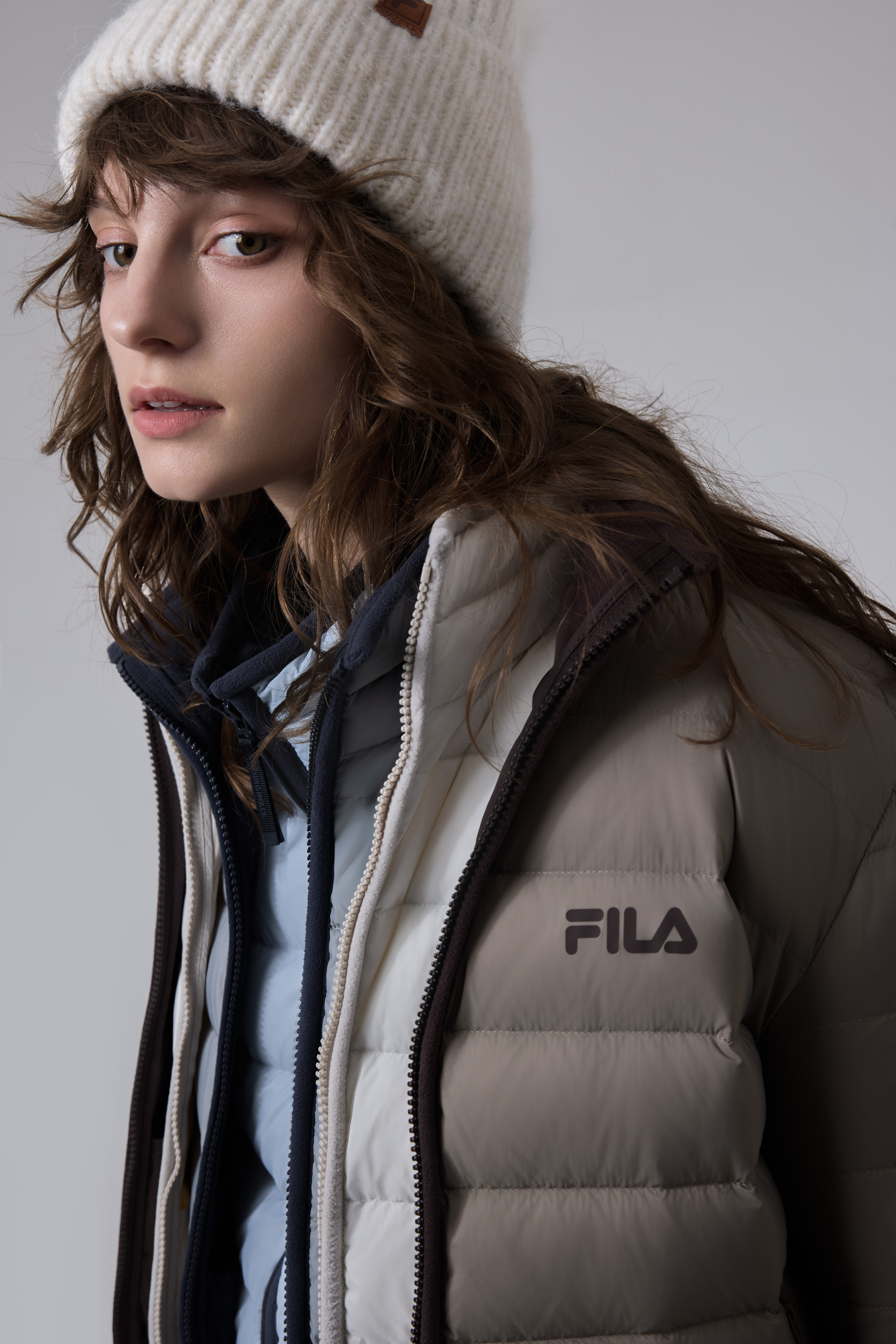 2026 秋冬FILA RGB暖肤羽绒上市，解锁高智叠穿新公式